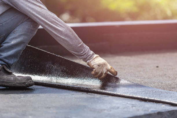 Professional Waterproofing technician working in Carthage, IN